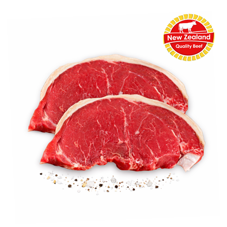 Two raw beef steaks with New Zealand Quality Beef logo on a white background